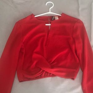 Red long sleeve blouse.